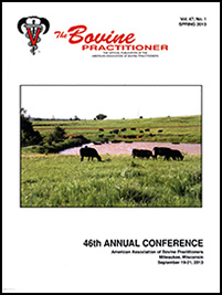 Cover image of Volume 47, No.1 of the Bovine Practitioner: a photo of Angus cattle grazing in a field of wildflowersalongside a muddy pool of water. In the background, some cattle are wading through the water and others are grazing on green fields that roll gently up to the horizon.