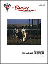 Cover image of Volume 50, No. 2 of the Bovine Practitioner: a photo of two cows sticking their heads through a fence to touch noses and graze