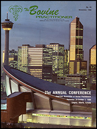 Cover image of the 23rd Volume of the Bovine Practitioner: a view of Stampede Park in downtown Calgary framed by one curving wing of the Scotiabank Saddledome.