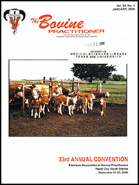 Cover image of Volume 34, no.1 of the Bovine Practitioner: a herd of cattle separated into pens with the mothers in the back pen and the calves in the pen closest to the photographer
