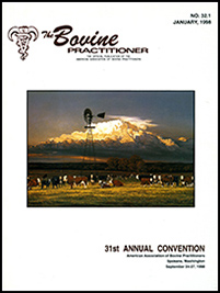 Cover image of Volume 32.1 of the Bovine Practitioner: a copy of the painting "Summer Scenes" by Bonnie Mohr which depicts a herd of cattle standing in a field with a dramatic skyscape in the background. The lighting is very warm and many of the cows gaze placidly at the viewer.