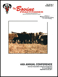 Cover image of Volume 45, No.2 of the Bovine Practitioner: a photo of a group of cattle examining a Jeep in a field. The Jeep has the licence plate "BEEF."