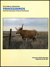 Cover image of the 40th Conference Proceedings: A single longhorn standing next to a barbed-wire fence on a cloudy day. Yellow background.