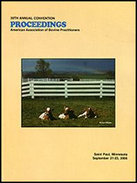 Cover image of the 39th Conference Proceedings: Three calves lying down in a pasture next to a white fence. Behind them, a rainbow spans over the distant hills. Yellow background.