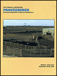 Cover image of the 35th Conference Proceedings: Holstein cows standing in a row at a fence. A small group of cattle are bunched together in a pen. Yellow background.