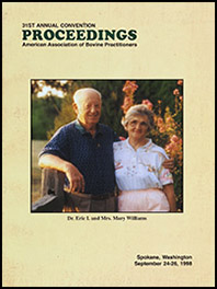 Cover image of the 31st Conference Proceedings: A photo of Dr. Eric I. and Mrs. Mary Williams smiling in golden light. Yellow background.